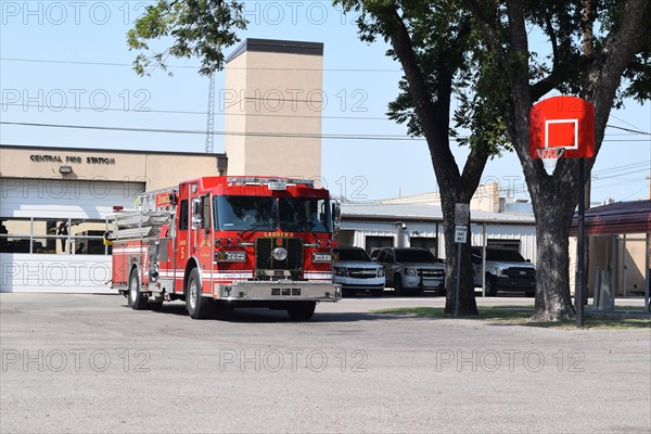 A fire engine, Ladder # 5, parked outside the Duncan Oklahoama fire department