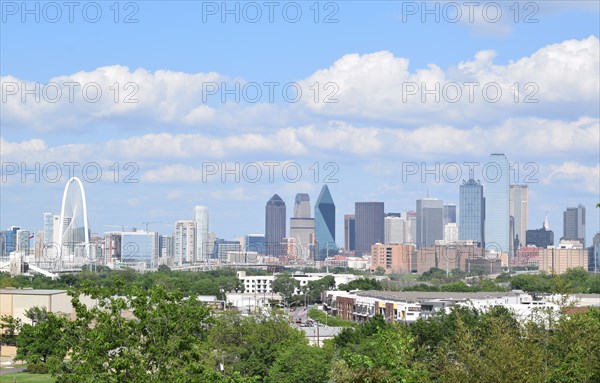 Skyline of Dallas Texas on a partly cloudy spring afternoon