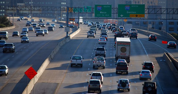 Busy late afternoon highway traffic in downtown Dallas, TX