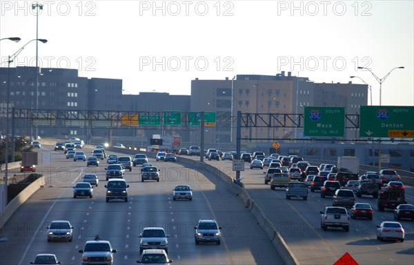 Busy late afternoon highway traffic in downtown Dallas, TX