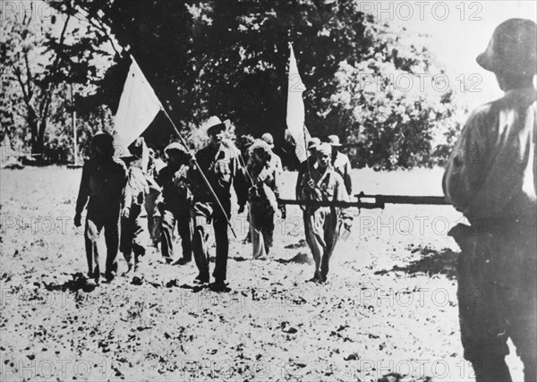 Native Philippines surrender to Japanese troops