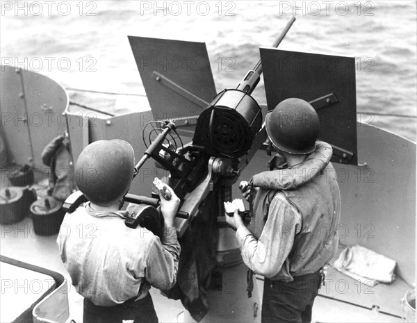 Gulping sandwiches without leaving one's station, 1942