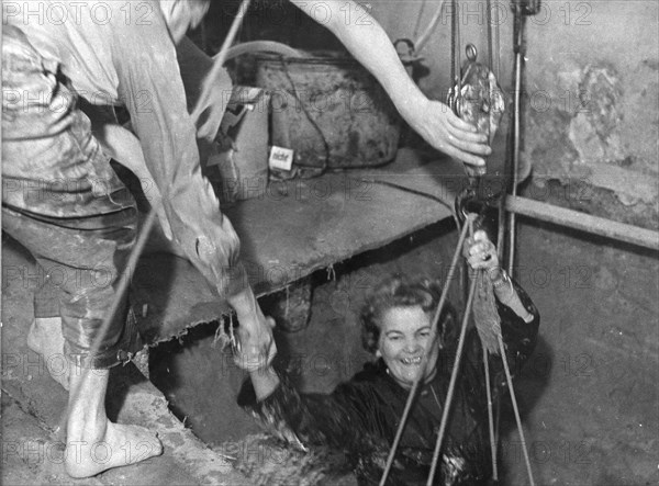 Escapee hauled into West Berlin from a tunnel under the Berlin Wall, 1964