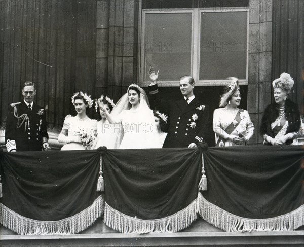 Royal Party waving to the crowds from the balcony of Buckingham Palace