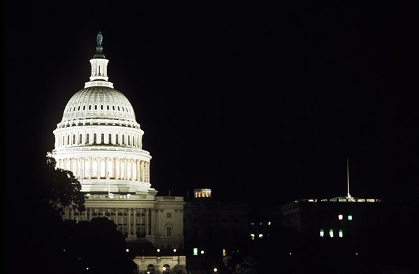 A nightime view of the United States Capitol.
