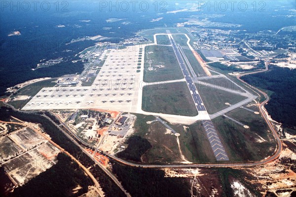 An aerial view of C-141 Starlifter and C-130 Hercules aircraft