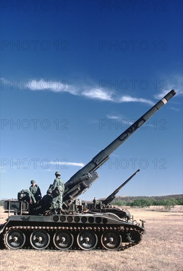 Ammunition is loaded into M107 175 mm self