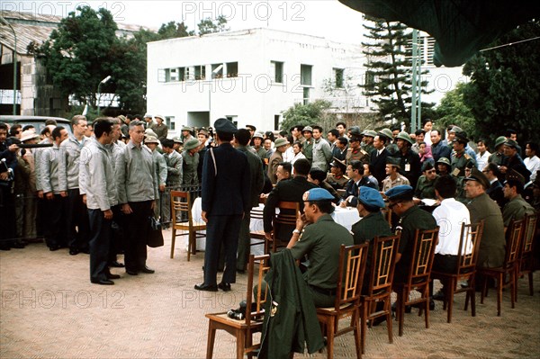 Col. Lynn is greeted by the Gia Lam Airport returnee delegation