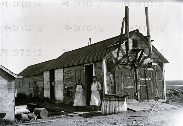 Men in Front of Kitchen