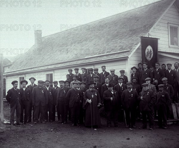 Men With Religious Banner