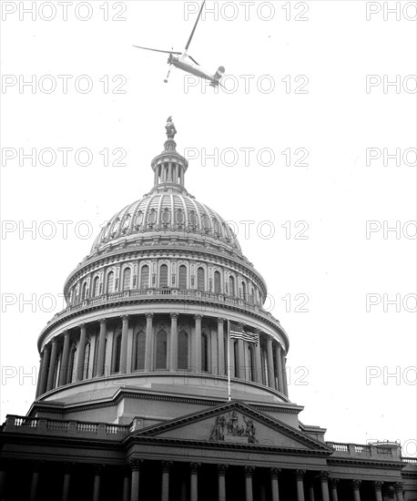 A helicopter type aircraft above the U.S. Capitol