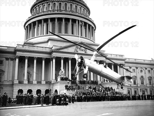 A helicopter type aircraft lands at the U.S. Capitol ca. April 28