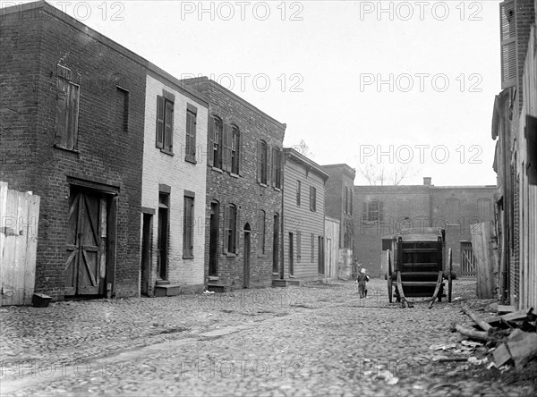 Alley in an urban United States slum area ca. 1914