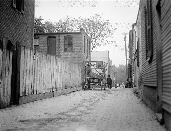 Alley in an urban United States slum area ca. 1914