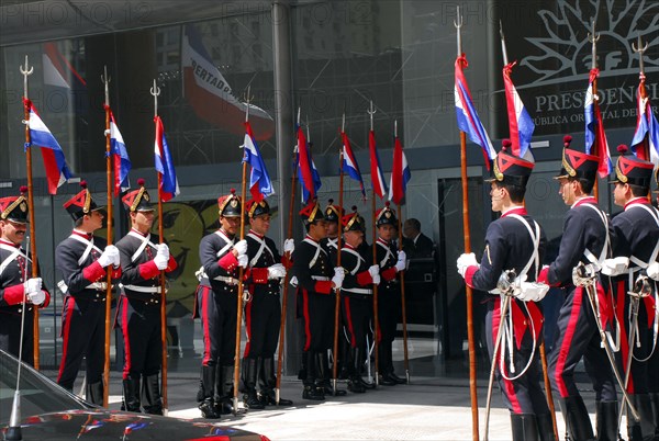 Blandengues Corps await the arrival of Hillary Clinton