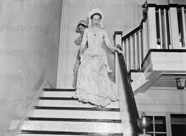 Bride walking down stairs