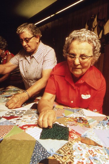 Closeup of Senior Citizens Quilting in New Ulm