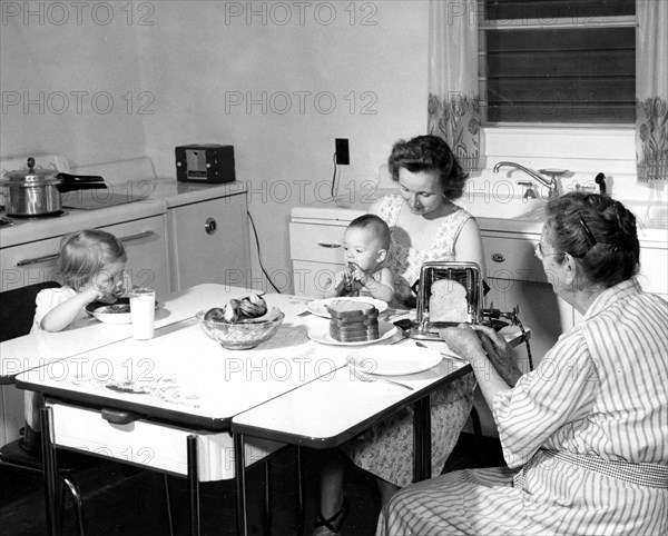 Farm people. Eating Breakfast. ca 1940s