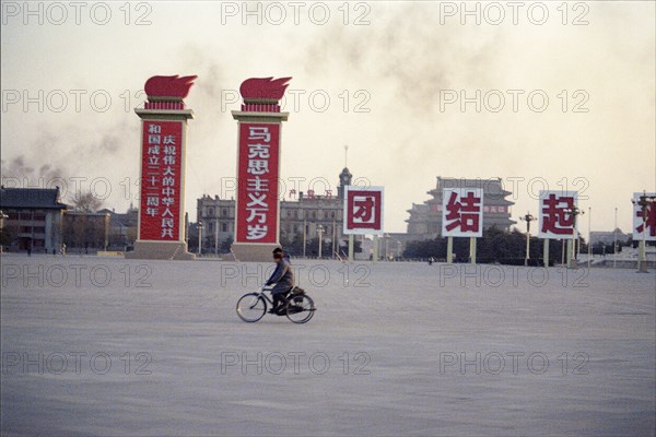 Street Scene with Signs and Bicyclists in Peking