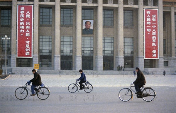 Street Scene with Signs and Bicyclists in Peking