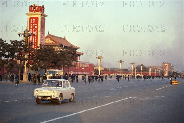 Street Scene with Signs and Bicyclists in Peking