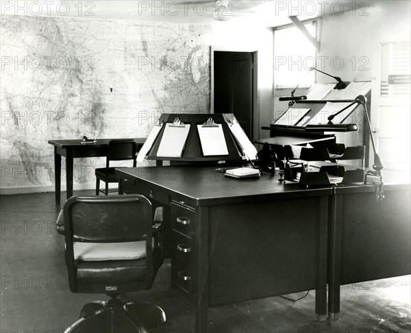 Forecast Desk With World Map on Wall Scottsbluff