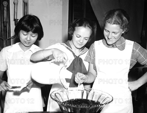 Girls preparing punch