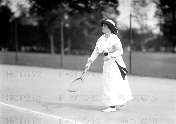 Miss Francis Lippett  playing tennis at a tournament in 1913