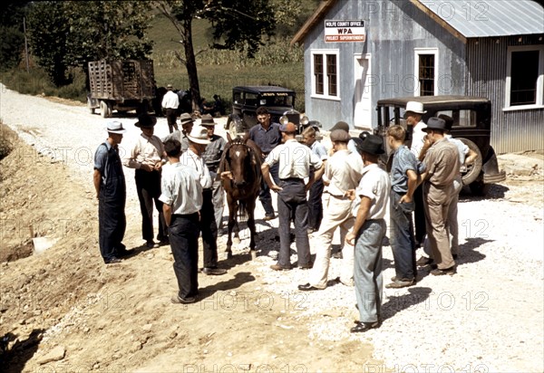 Mountaineers and farmers trading mules and horses