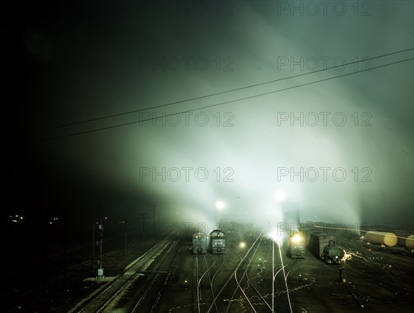 Night view of part of Santa Fe R.R. yard