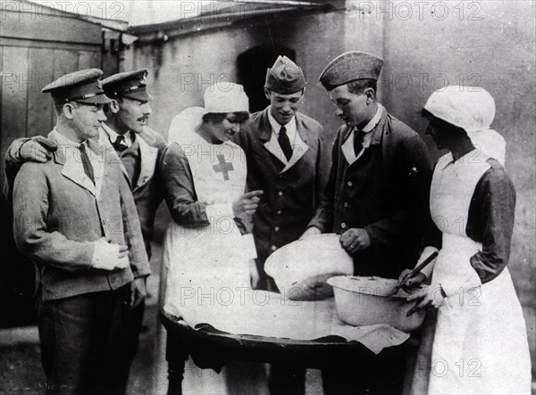 Patients helping nurses in the kitchen s