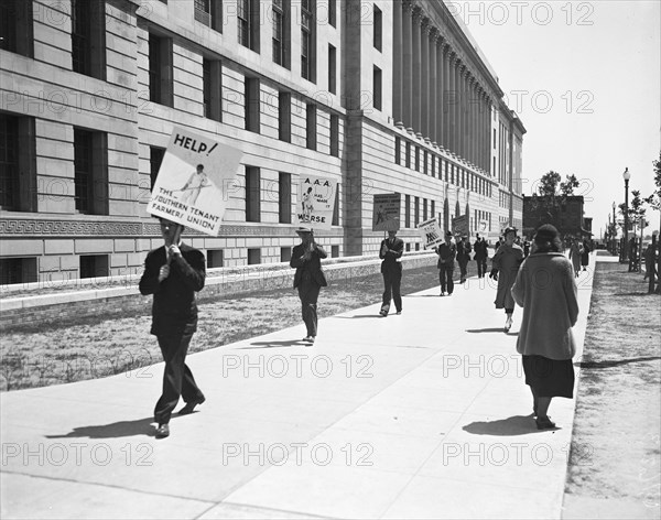 Picketers with signs