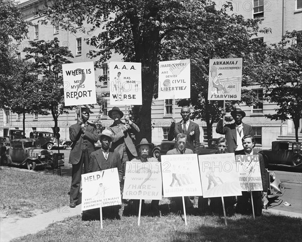 Picketers with signs