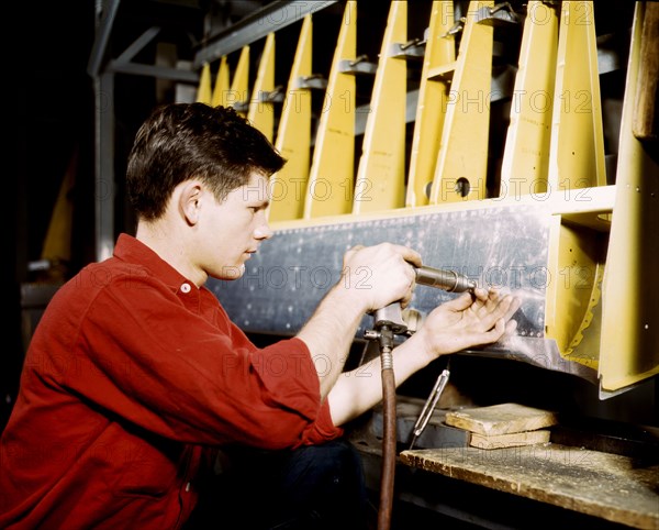 Riveter at work