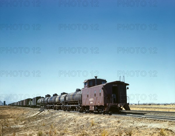 Santa Fe R.R. west bound freight stopping for water