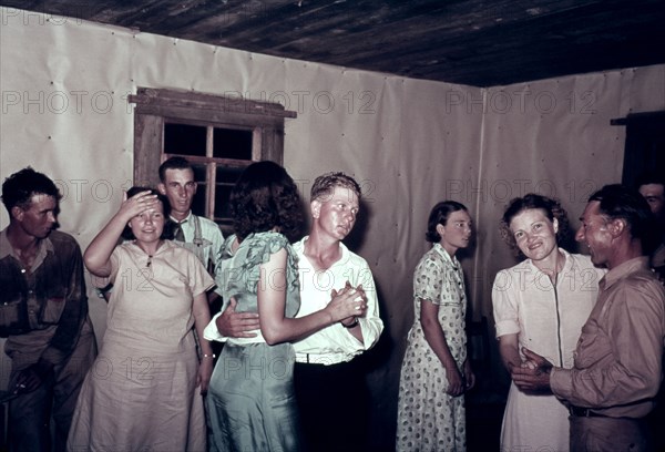 Scene at square dance in rural home in McIntosh County