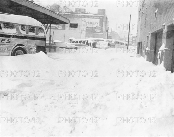 Snow Clogged Parking Lot with Buses