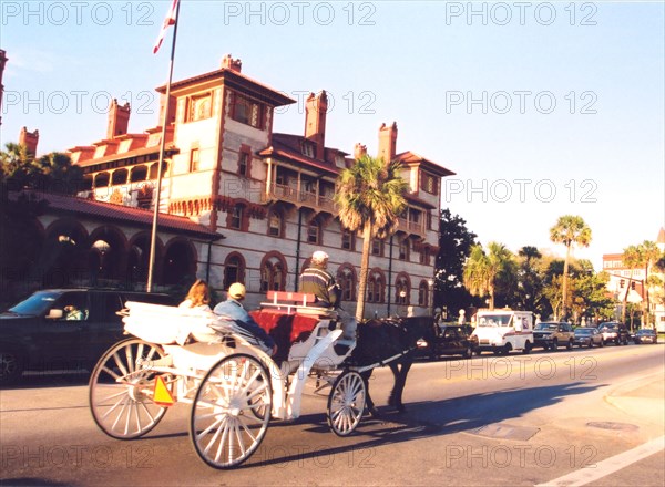 Tourists enjoy a horse ride