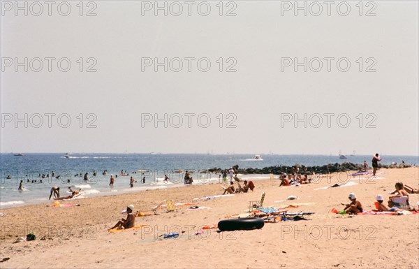 Tourists relaxing on a South Florida beach