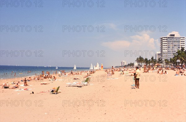 Tourists relaxing on a South Florida beach