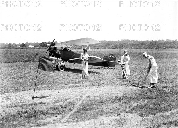 Women playing aerial golf