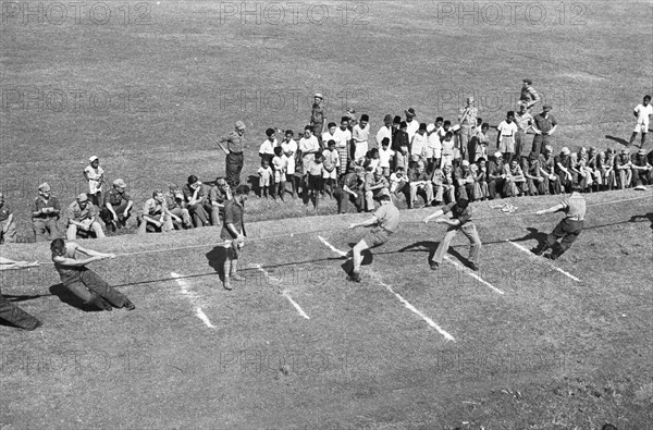 Indonesia History - Te Poerwakarta celebrated Queen's Day 1948 with a game of tug of war ca. 1948.