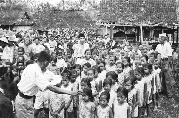 A aubade from a children's choir; Date December 8, 1947; Location Dadapajan, Indonesia, Java, Dutch East Indies, Salatiga