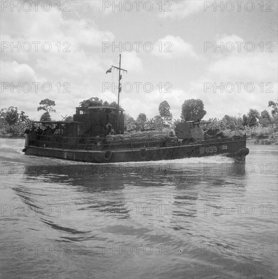 1947 - Patrol boat on a river in Indonesia, Dutch East Indies