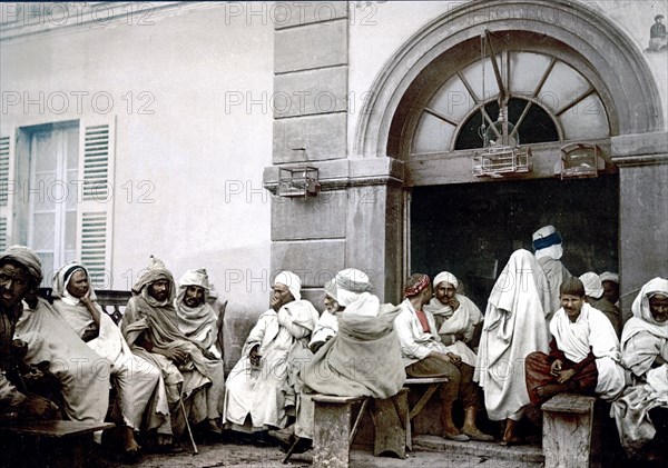 Arabs at a cafe, Algiers, Algeria ca. 1899