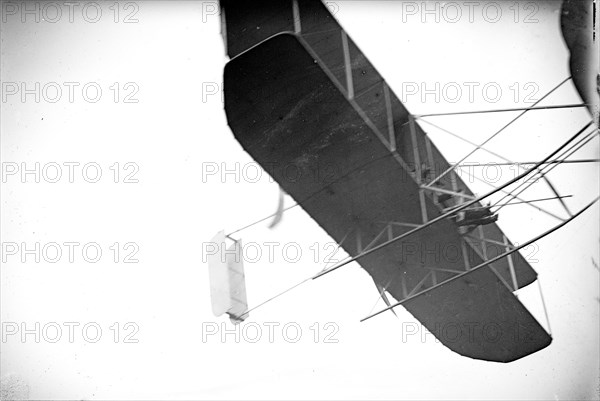 Orville Wright and aeroplane, in flight 7 1 1909