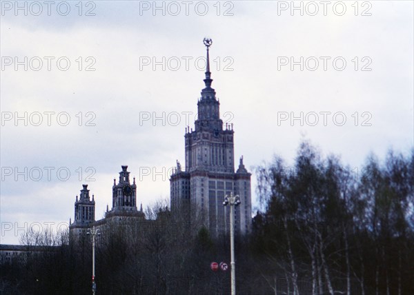 Buildings and architecture in a major city in Russia, communist star on top of building - Moscow State University ca. 1978