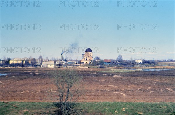 A factory in the Russian countryside spewing pollutioin in the late 1970s (1978) - factory in USSR countryside