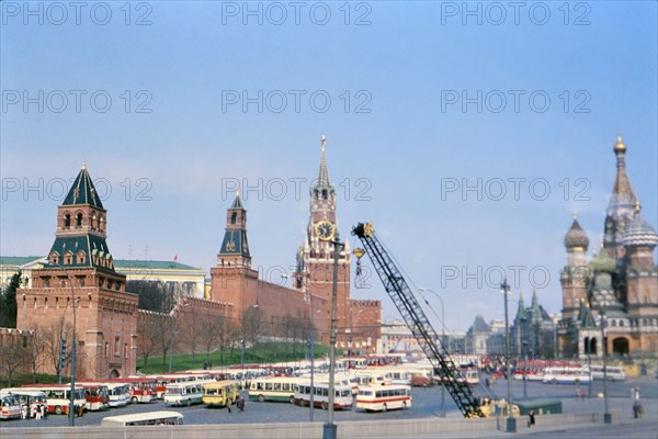 Buildings and architecture in Moscow Russia, buses parked in Red Square ca. 1978