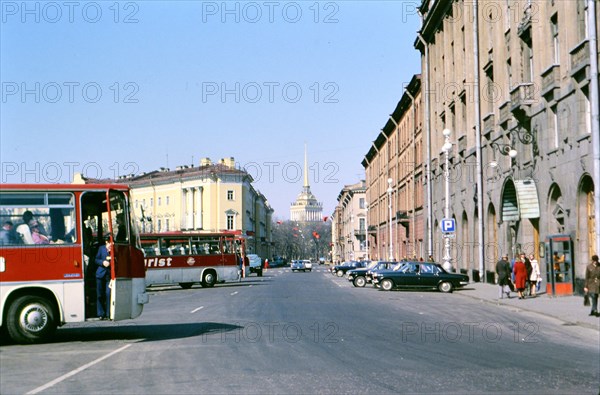 Soviet Buildings and Architecture - buses parked near a building in a large city in Russia in the late 1970s (1978)